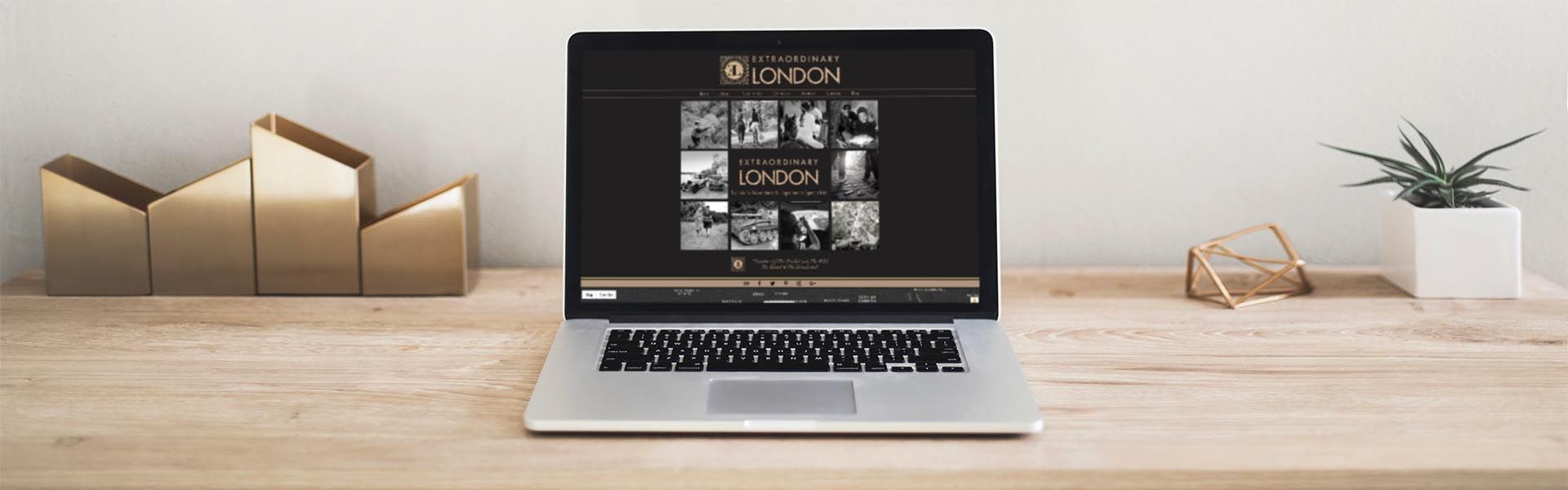 a laptop is open to a website for the extraordinary london