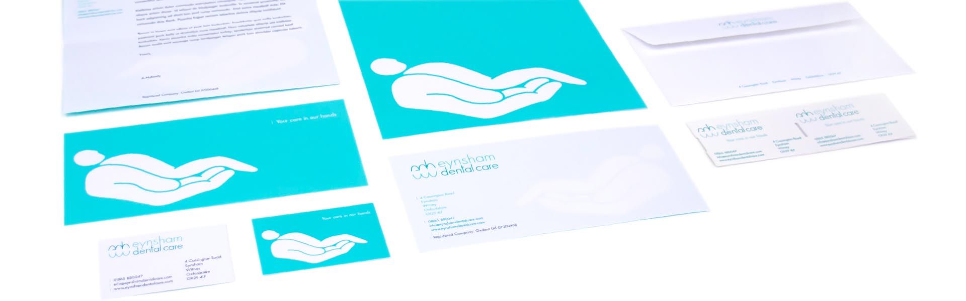 a set of stationery for a dental care company