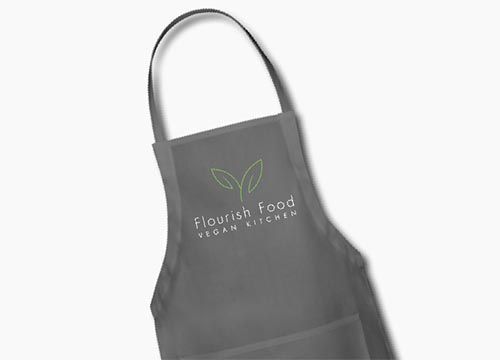 a gray apron with the words