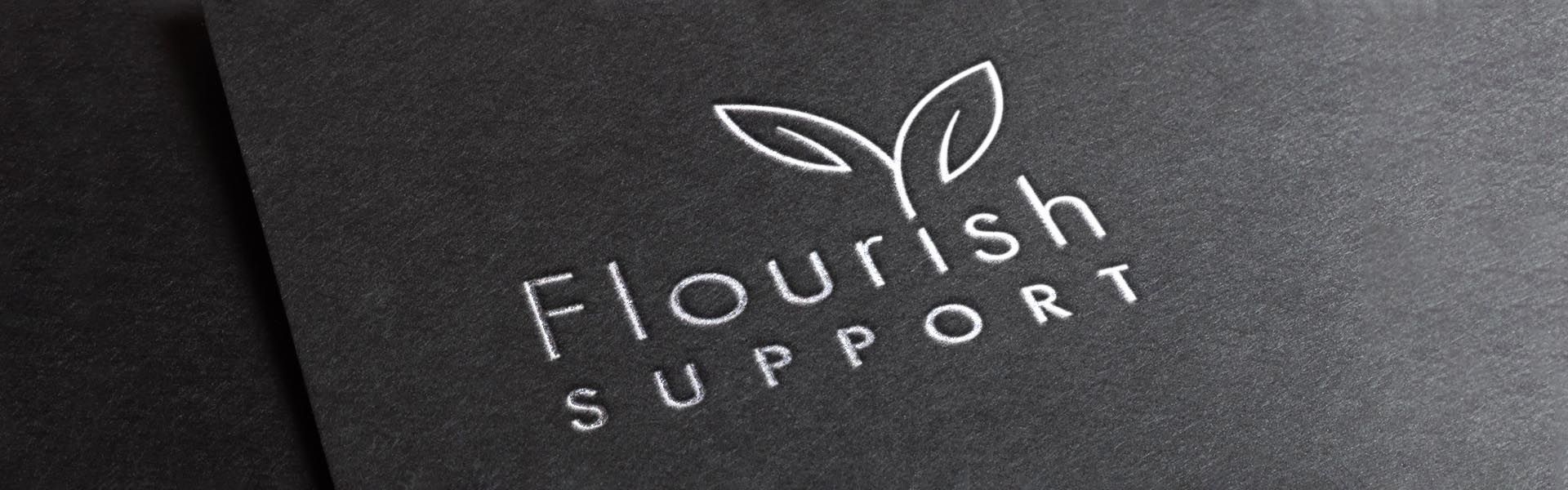 flourish support is written on a black piece of paper