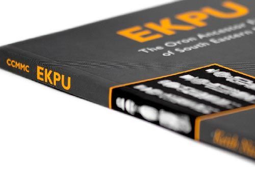 a close up of a book titled ekpu for the horniman museum on a white background.