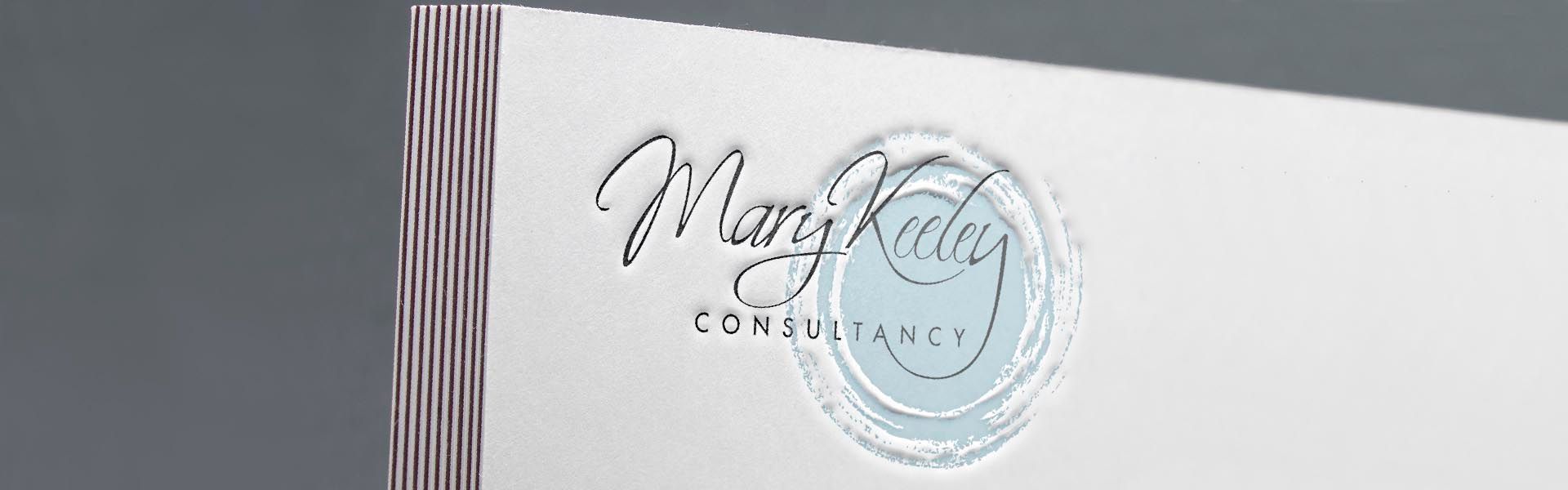 a logo for mary keeley consultancy is on a piece of paper