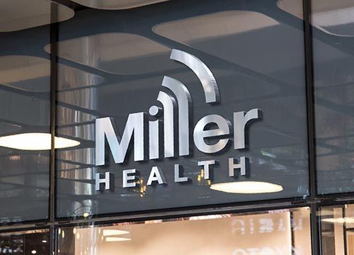 a miller health sign is on a glass window .