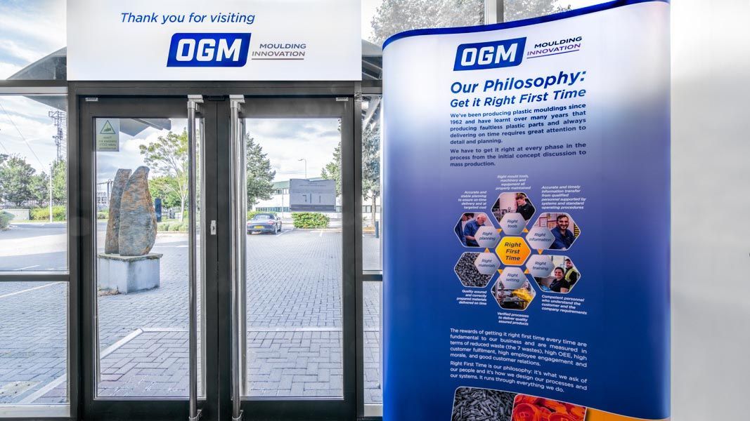 a sign that says thank you for visiting ogm molding innovation