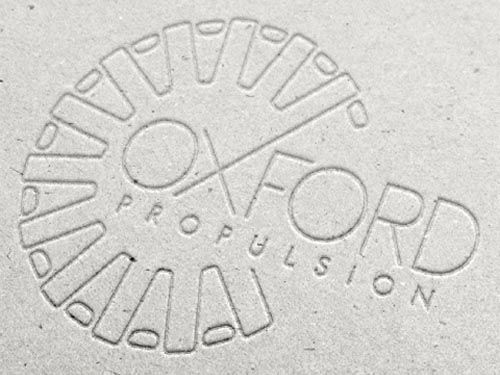 a logo for oxford propulsion is embossed in to grey card.