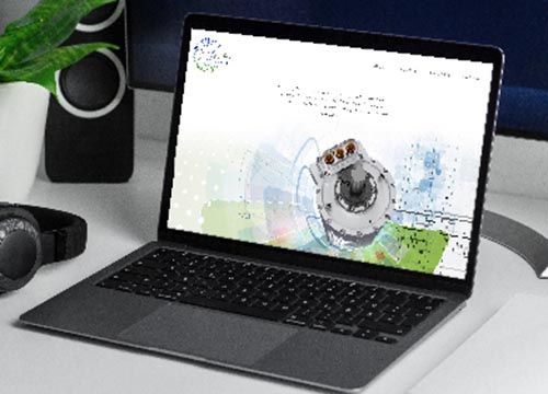 a laptop with a picture of an EV motor on the screen