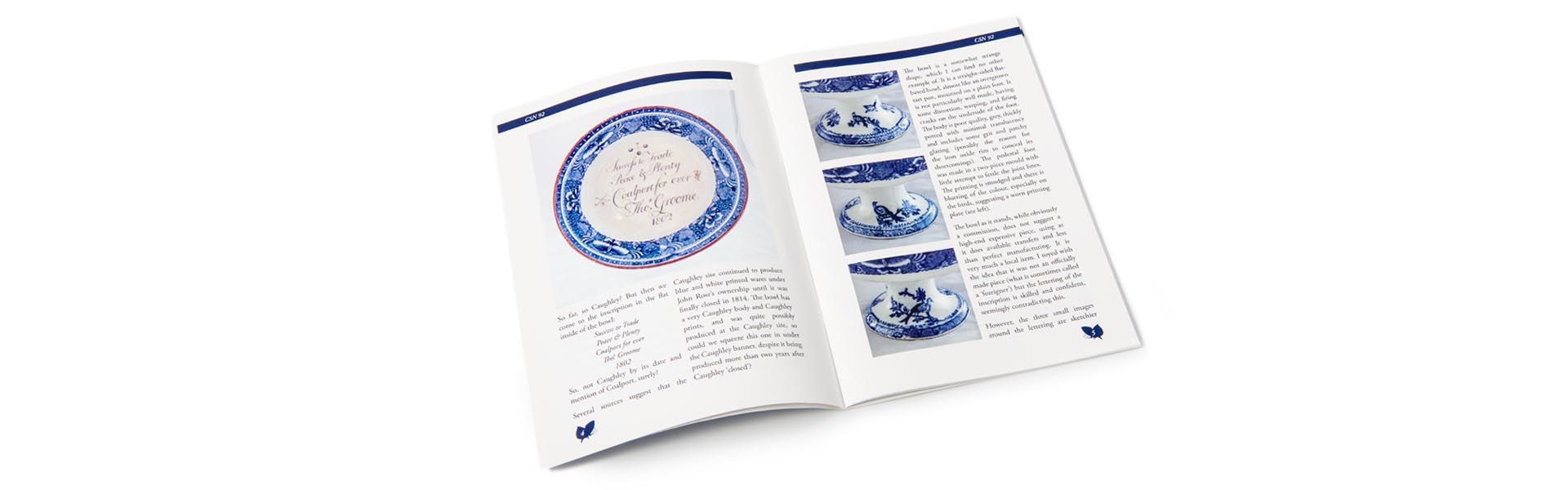 a copy of the caughley society newsletter is open to a page with a picture of a blue and white plate