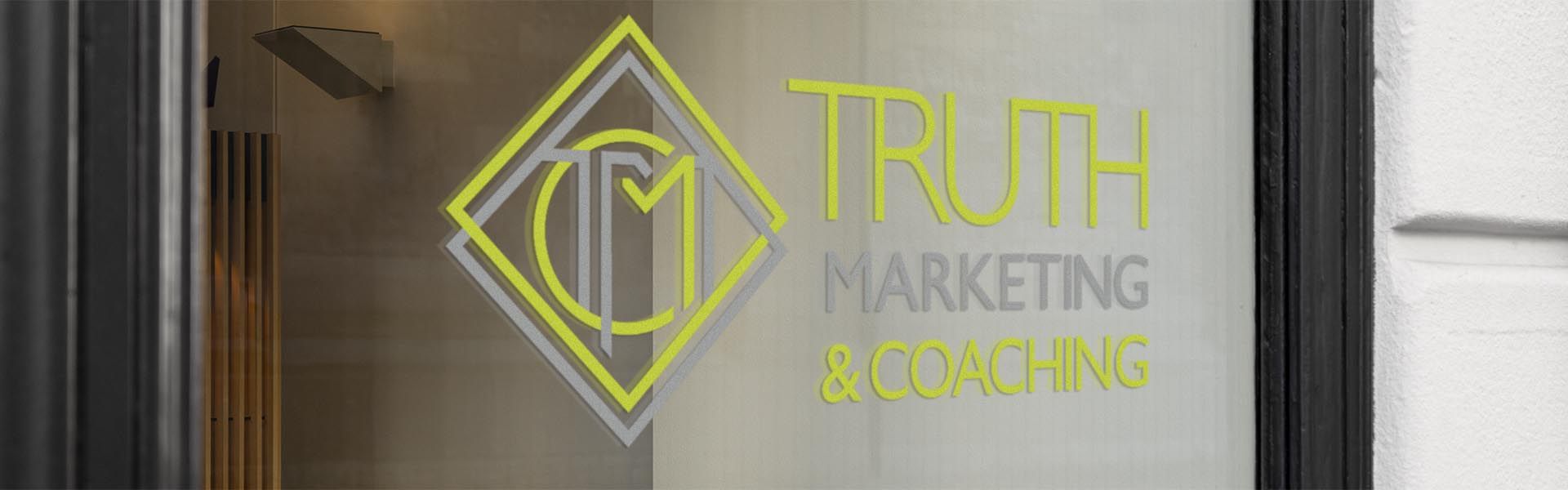a vinyl window sign that says truth marketing and coaching on it