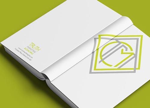 a book is open to a page with at the truth marketing and coaching logo on it .