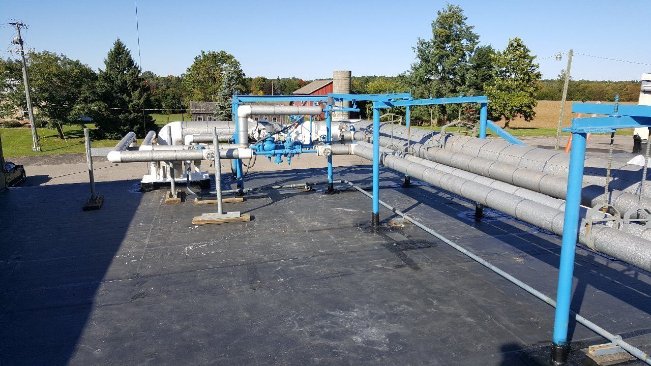 Pipes on the Industrial Roof — Hillsdale, MI — Braman Roofing