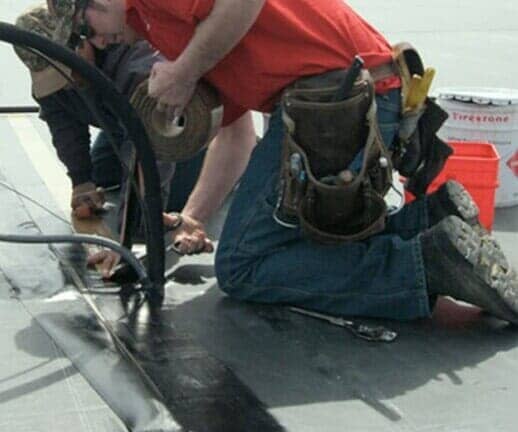 Workers Sealing the Roof — Hillsdale, MI — Braman Roofing