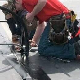 Workers Finishing a Roof — Hillsdale, MI — Braman Roofing