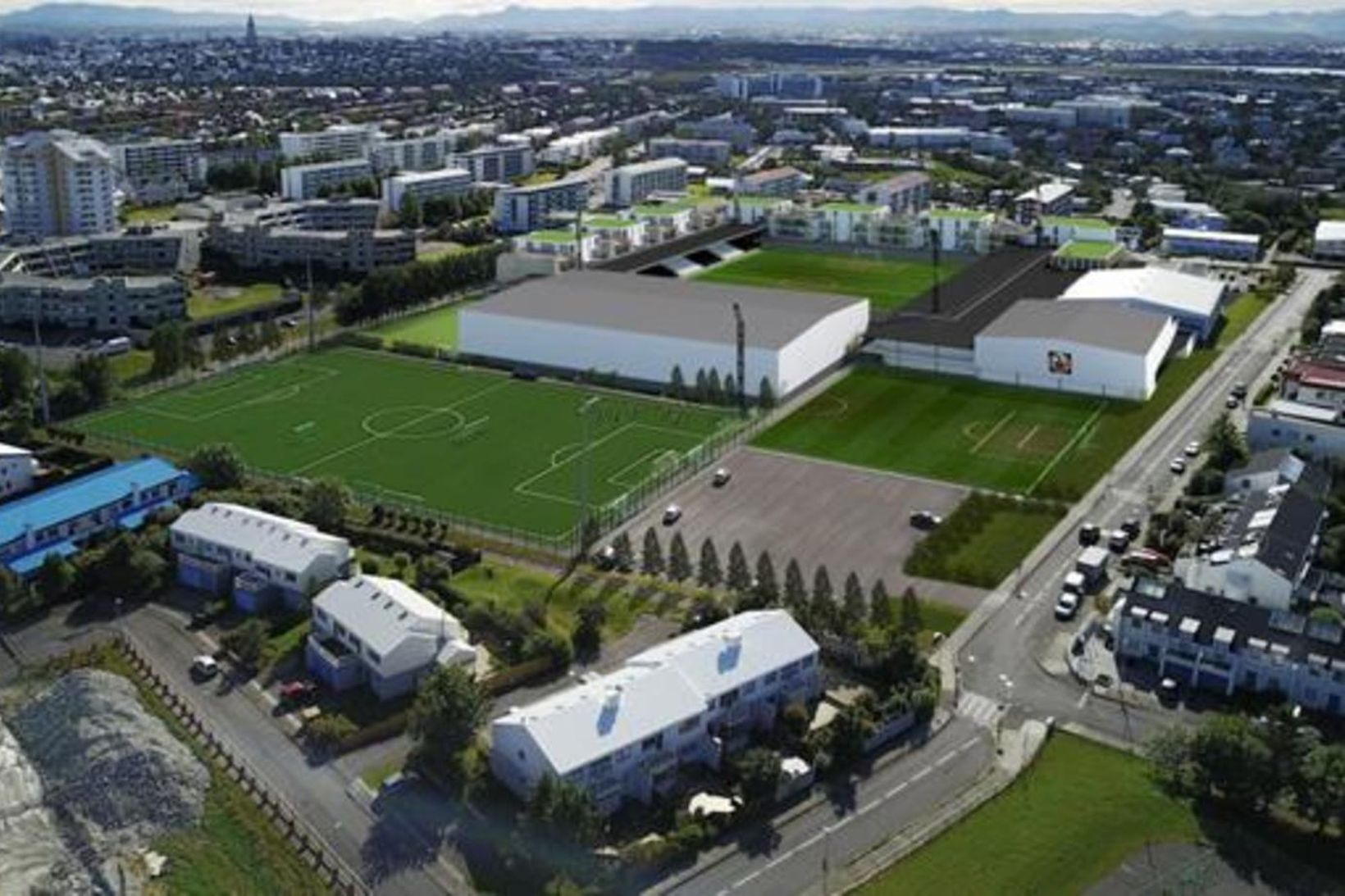 Svona mun KR-svæðið í Frostaskjóli líta út. Nýja fjölnota íþróttahúsið er fyrir miðri mynd, á milli aðalvallarins og æfingavallarins.