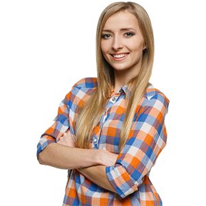 a woman in a plaid shirt is standing with her arms crossed and smiling .