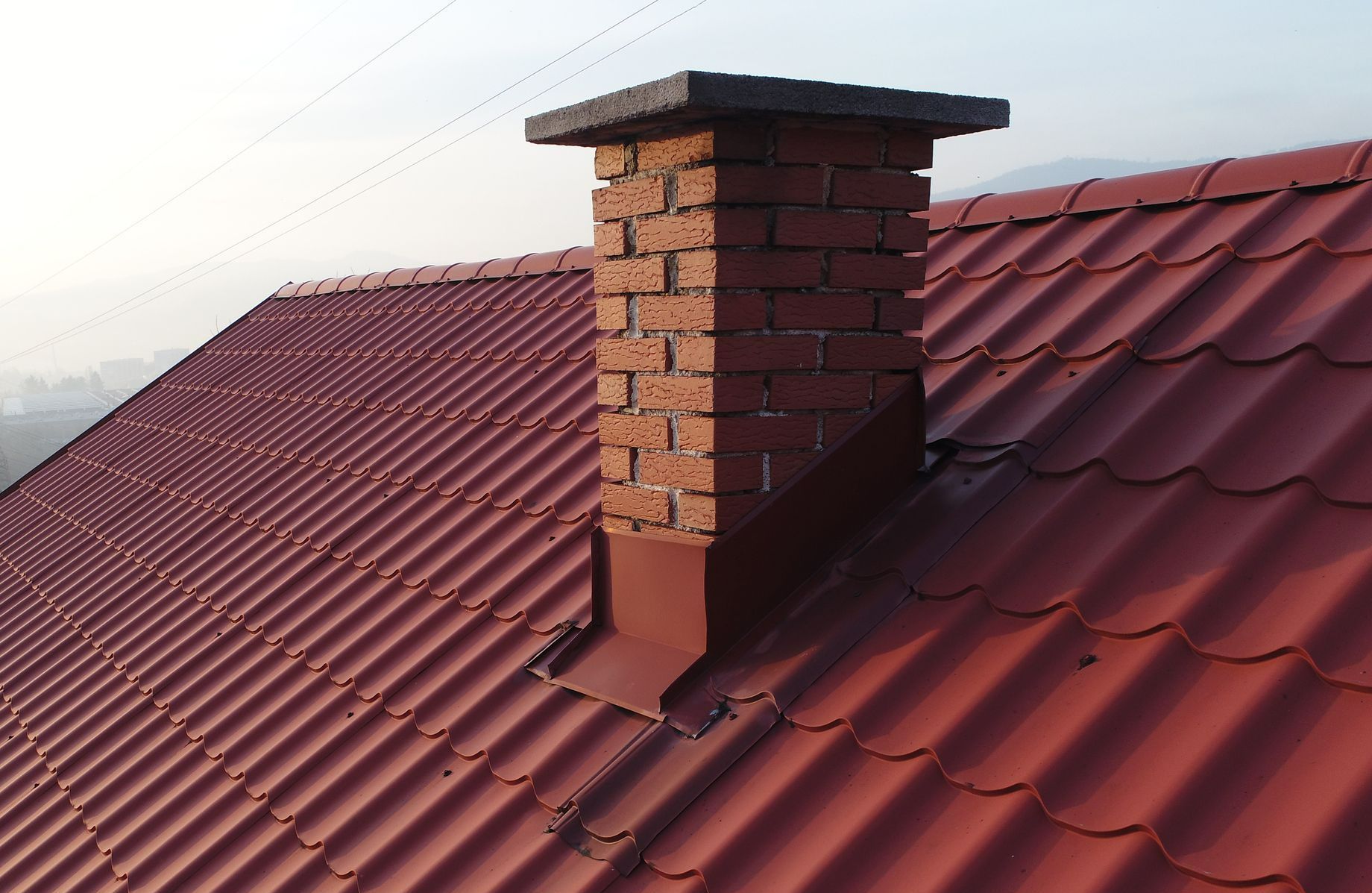 Red Roof With Chimney — Sacramento, CA — Bernardino Roofing