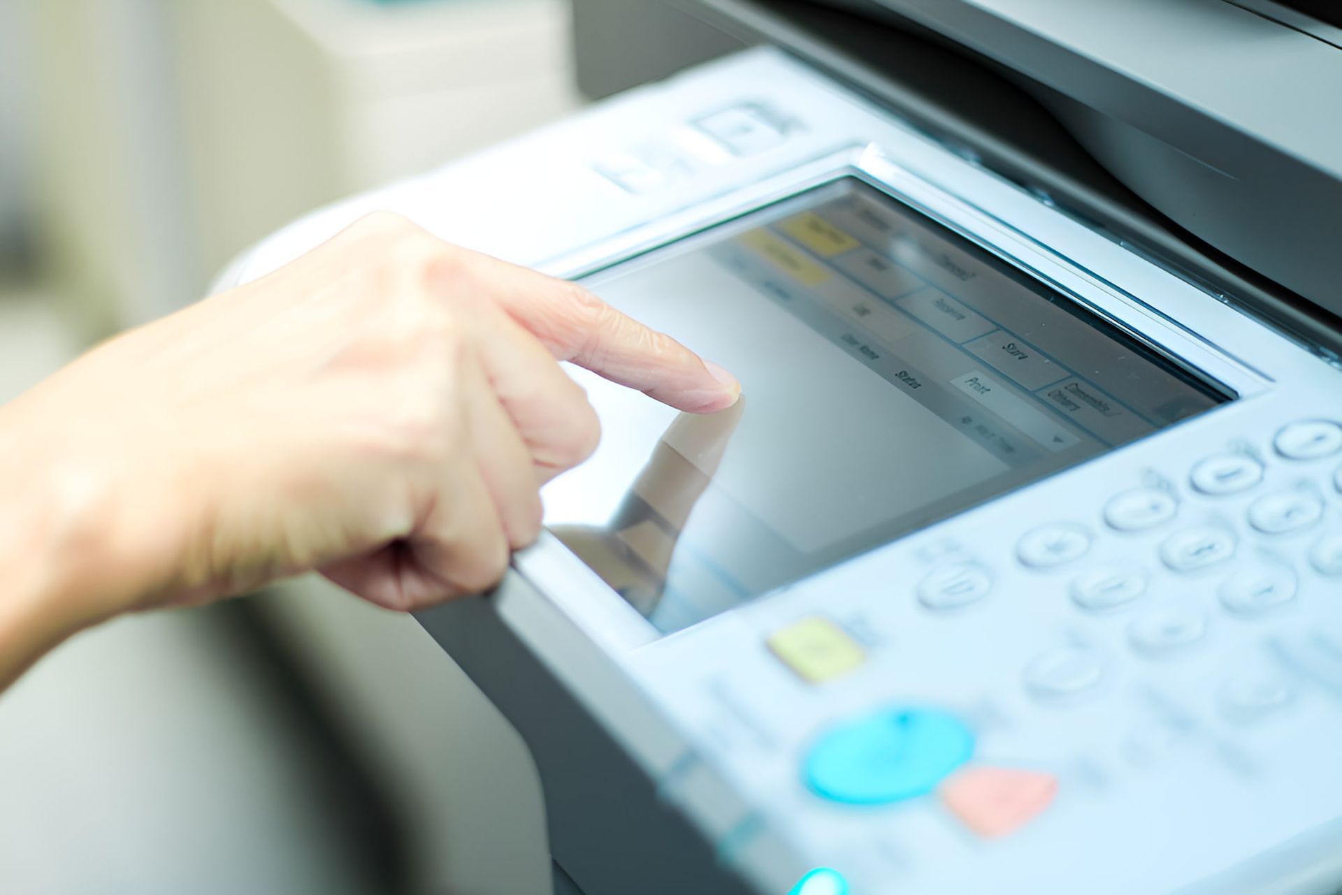 A Person is Pressing a Button on a Printer — Print Spot Group in South Murwillumbah, NSW