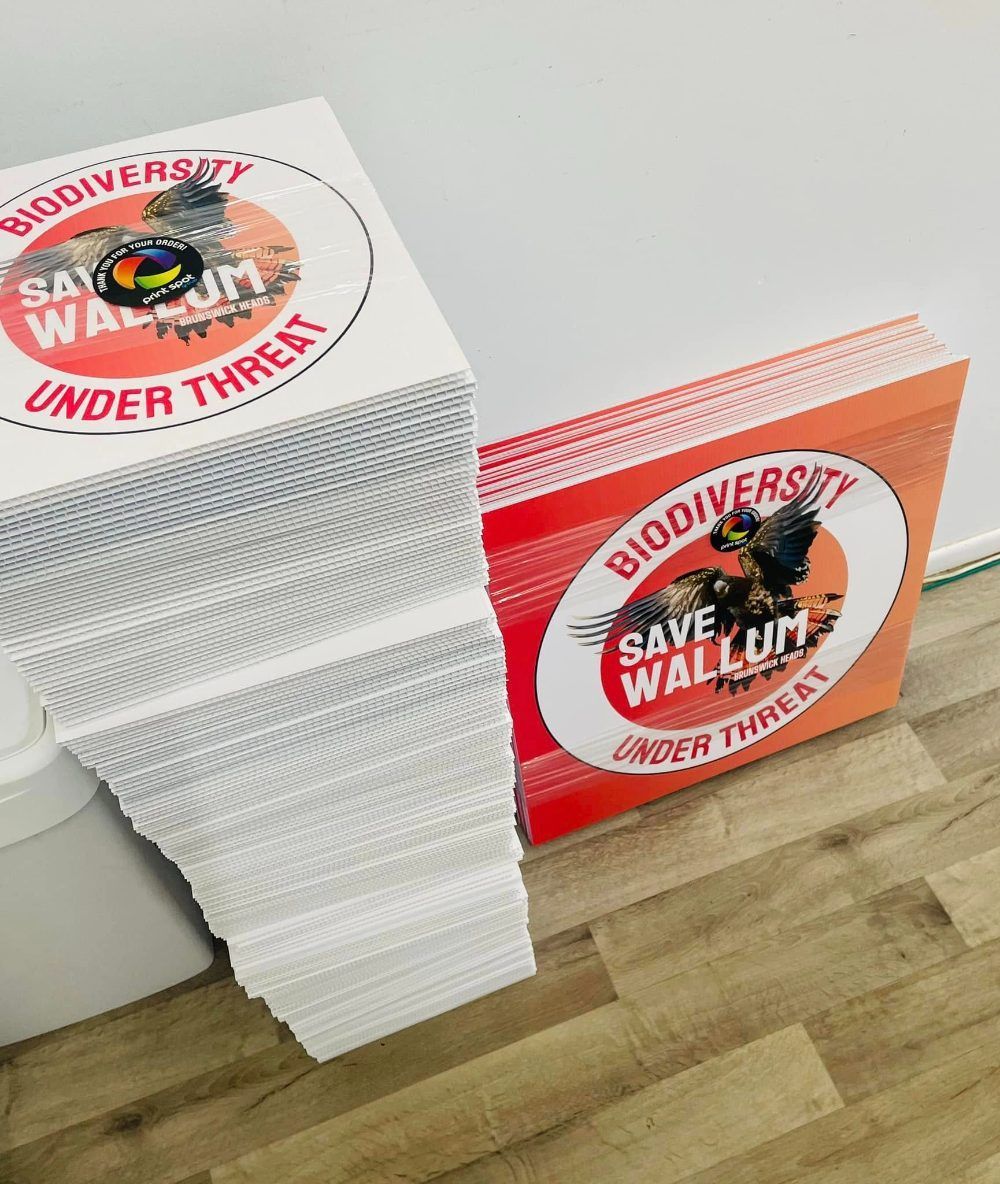 A Stack of Save Wallum Signs on a Wooden Floor — Print Spot Group In Tweed Heads, NSW