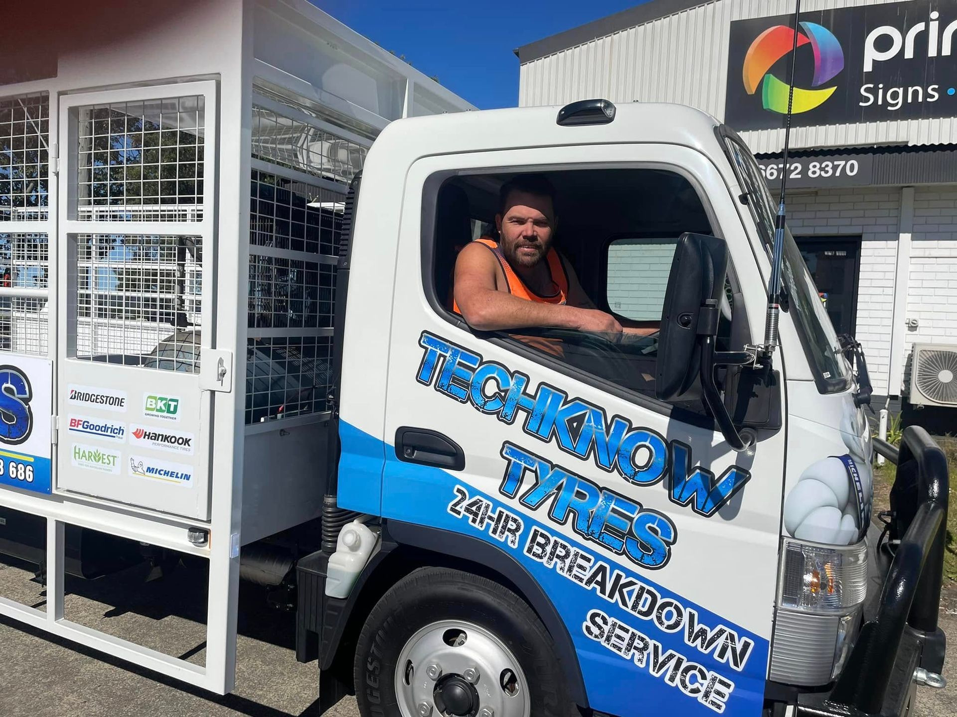 A Truck is Parked in Front of a Building — Print Spot Group in South Murwillumbah, NSW
