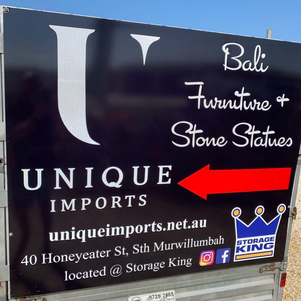 A large black printed sign — Print Spot Group in South Murwillumbah, NSW