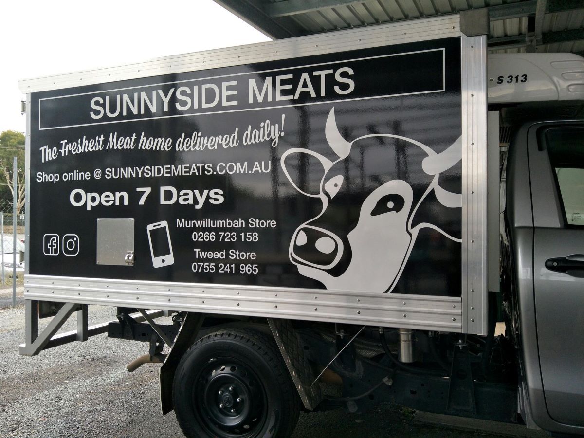 A Truck With a Cow on the Side of It — Print Spot Group in Coolangatta, NSW