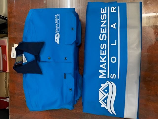 Blue TShirt With Company Print On It — Print Spot Group in Tweed Heads, NSW