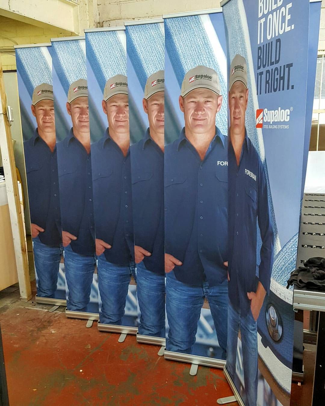A Large Roll-Up Banner Featuring a Man — Print Spot Group in South Murwillumbah, NSW
