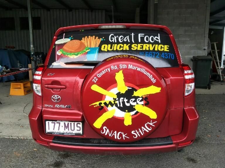 Red Truck With Swiftees Sticker — Print Spot Group In Tweed Heads, NSW