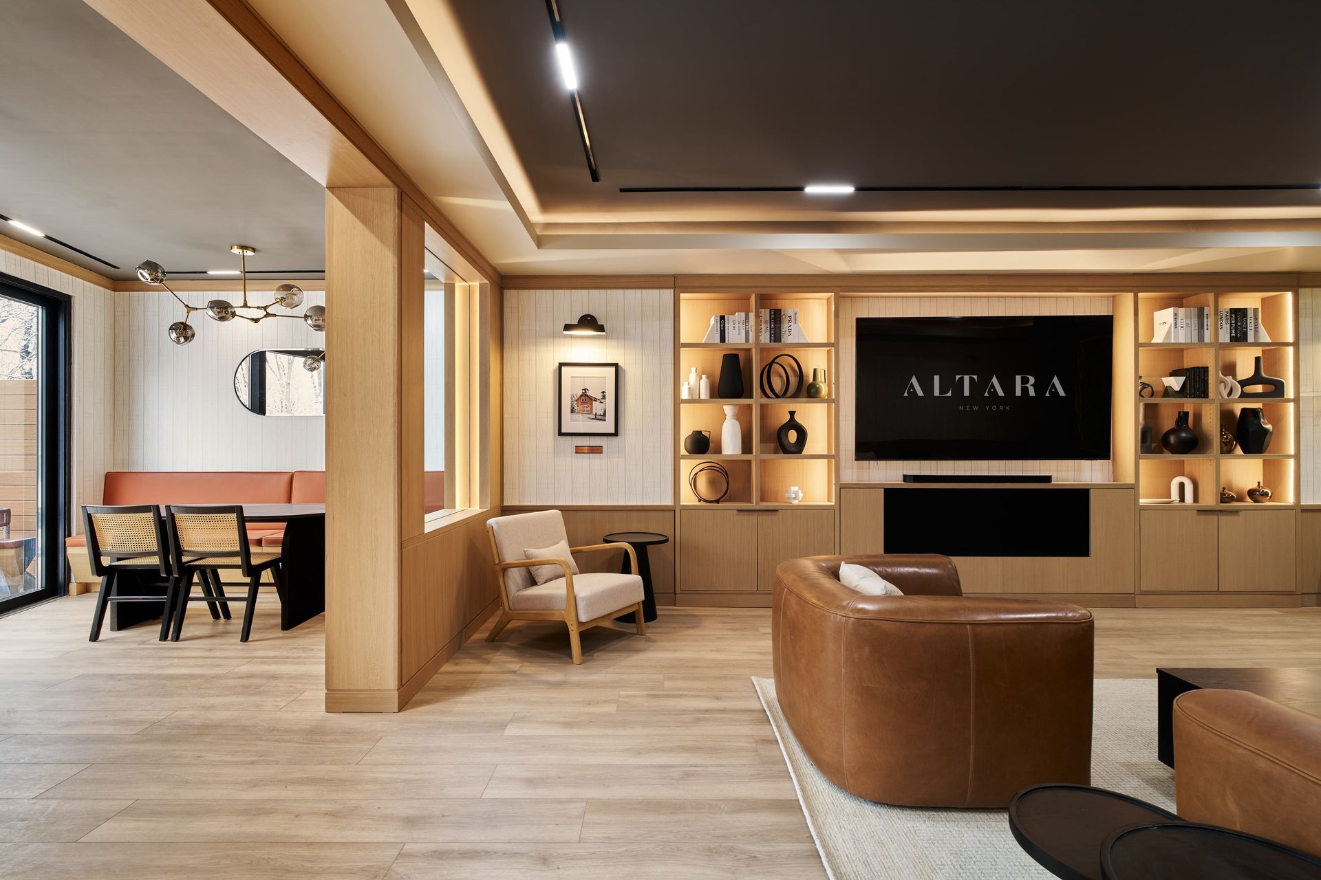 A living room with a large flat screen tv that says altara on it