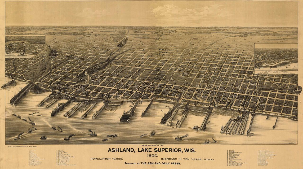 Sepia aerial map of a city labeled “Holland Lake Shore Area,” showing streets, shoreline, and harbor