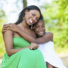 Happy mother and child. Child custody, adoption representation.