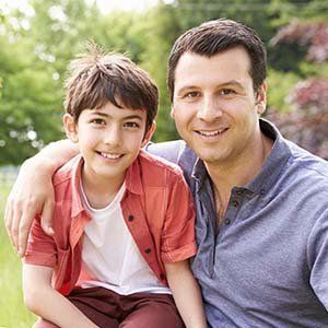 Happy father and son. Attorney divorce, custody and adoption.