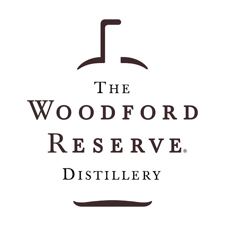 Woodford Reserve Distillery logo: brown text and symbol on white; "The Woodford Reserve" with a stylized flask.
