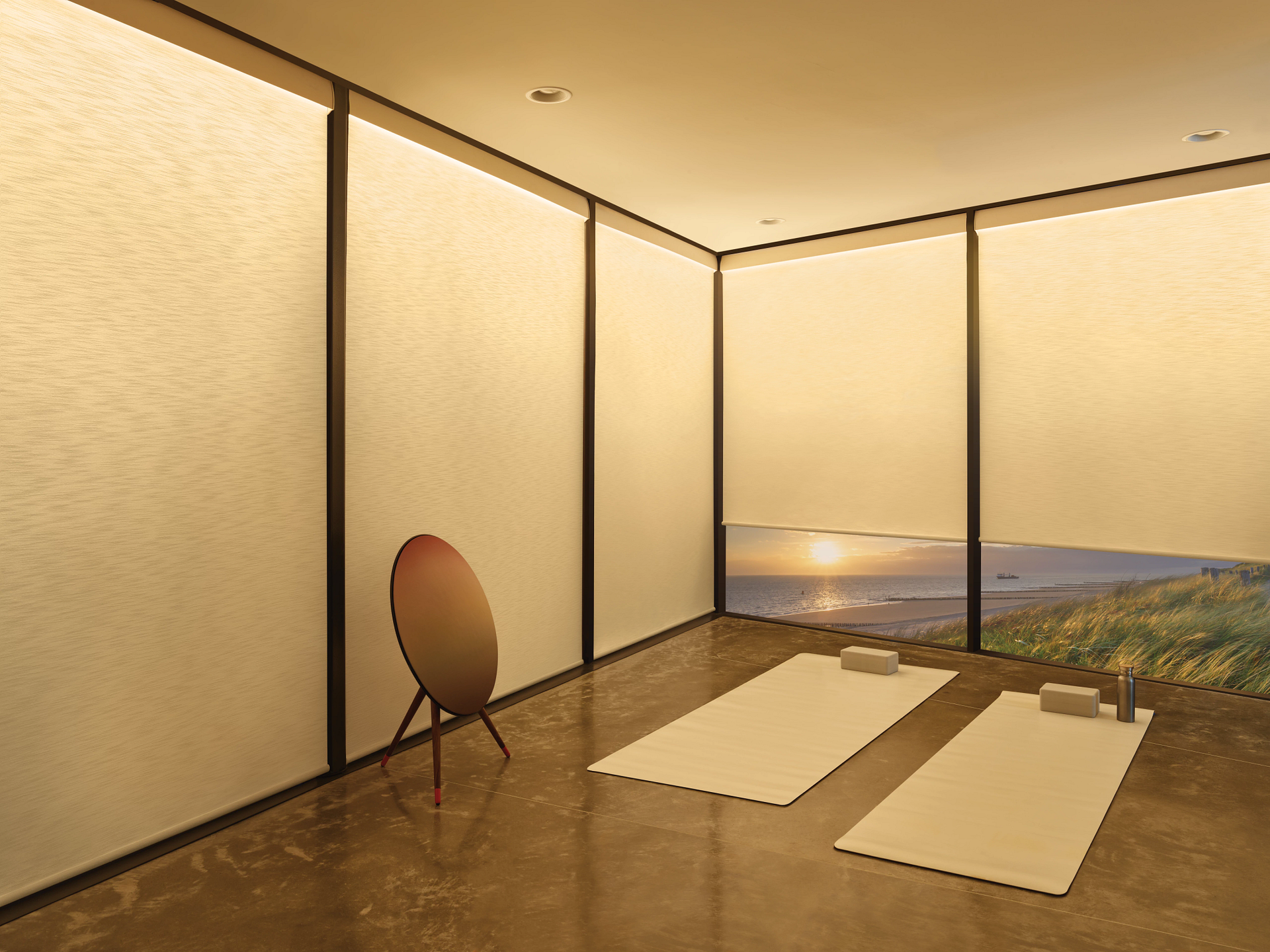 Workout room with warm Aura® Illuminated Shades