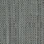 Close-up of a gray woven textile with a textured, grid-like pattern.
