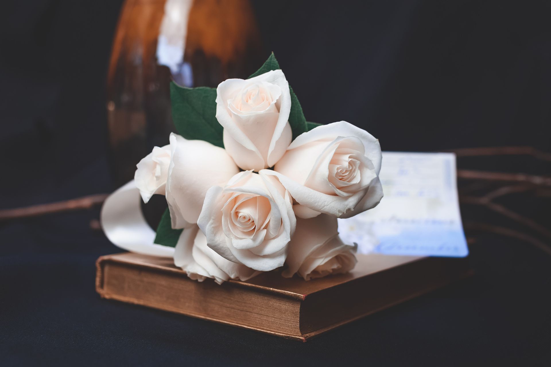 bouquet of white flowers with urn for direct cremation