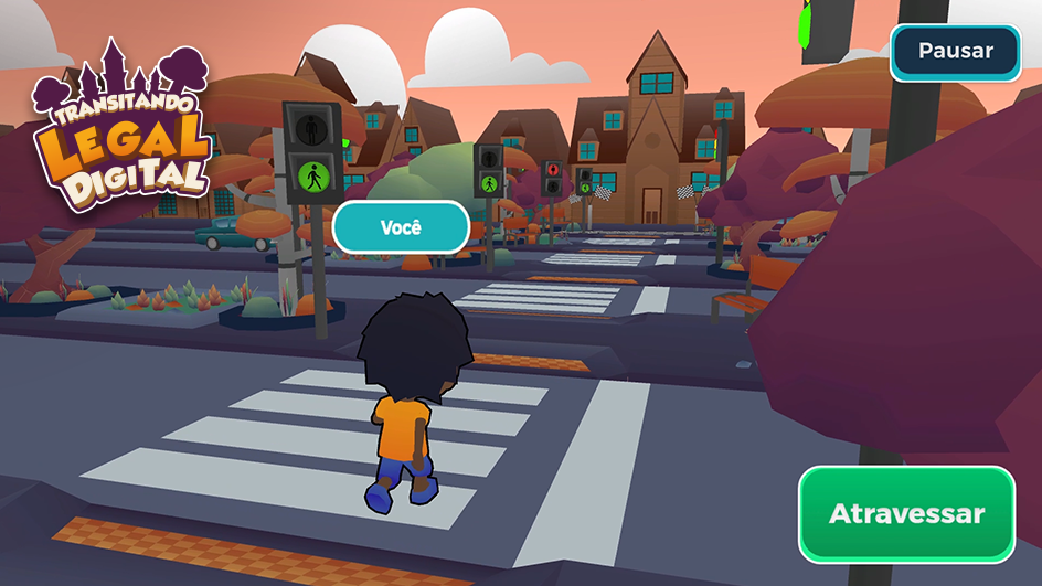 A boy is walking on the crosswalk playing a video game.