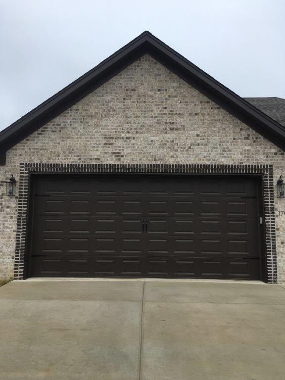 Brick House With Carriage Garage Door — Sherwood, AR — Harmon Overhead Door