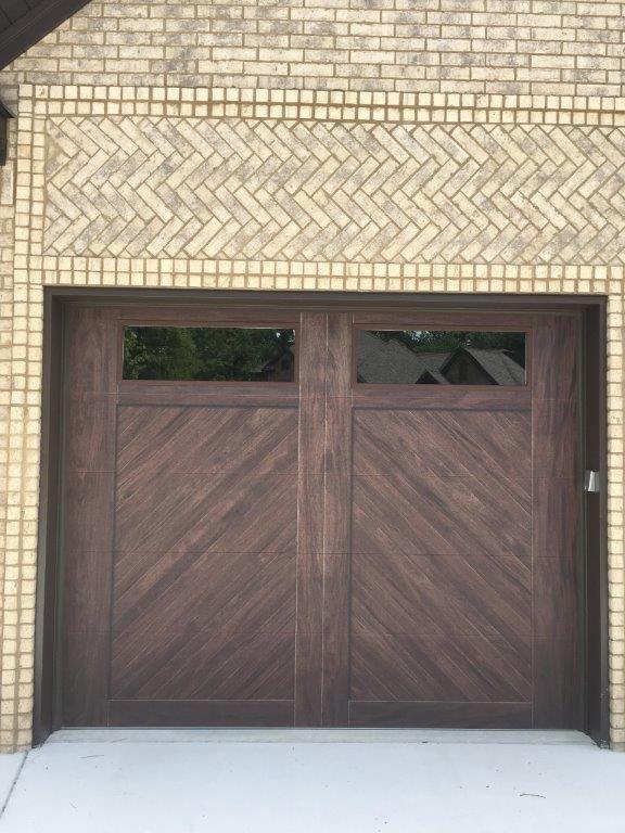Yellow Brick Wall With Wooden Style Garage Door — Sherwood, AR — Harmon Overhead Door