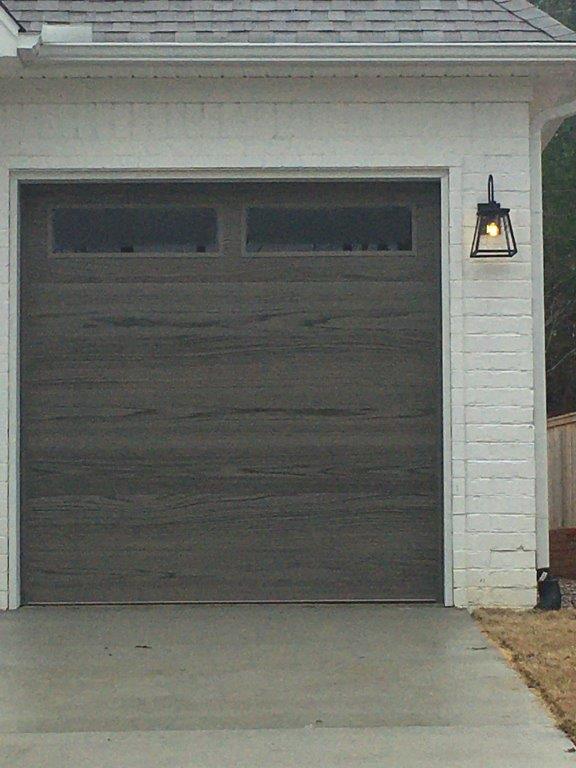 Garage Door With Outdoor Wall Lamp — Sherwood, AR — Harmon Overhead Door