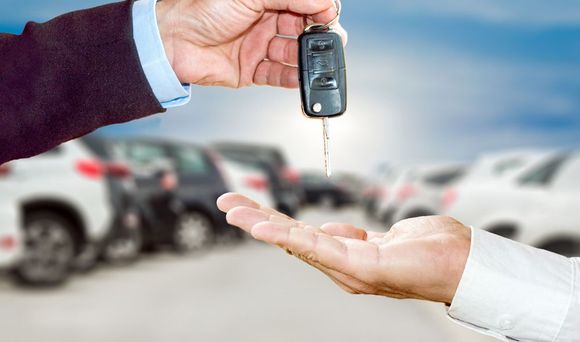 Handing Over Car Key — Ronceverte, WV — Square Deal Pre-Owned Cars & Trailer Sales