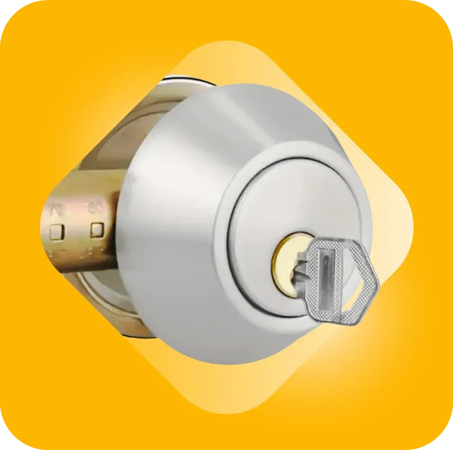 Close-up Of Deadbolt Lock With Key Inside A Rhombus Shape, Against An Orange Background. Close-up Of Deadbolt Lock With Key Inside A Rhombus Shape, Against An Orange Background.