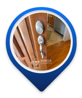 A Close-up Of A Partially Open Wooden Door With Metal Deadbolt And Handle.