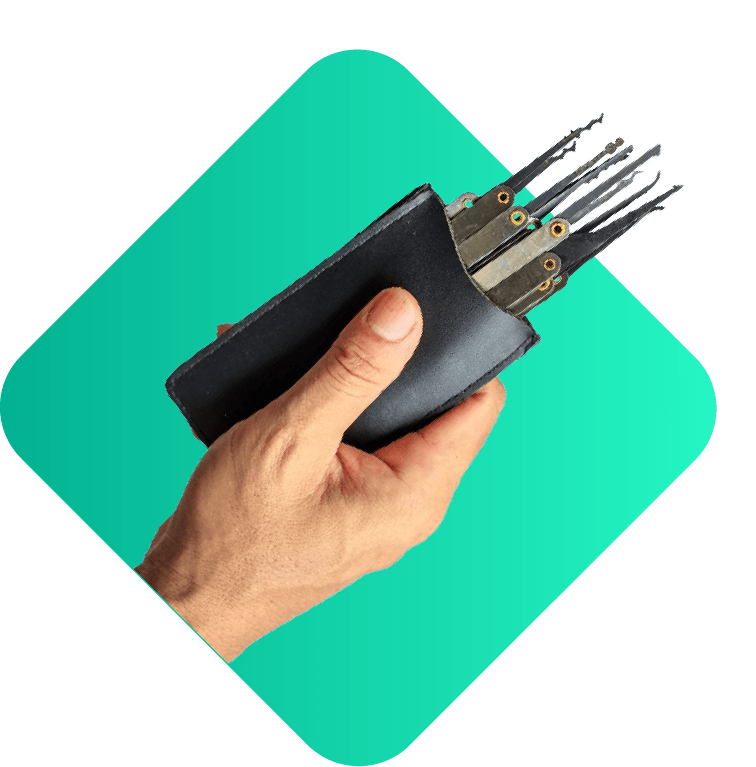 A Hand Holding A Black Leather Case Containing Lock Picking Tools Against A Blue Background. A Hand Holding A Black Leather Case Containing Lock Picking Tools Against A Green Background.