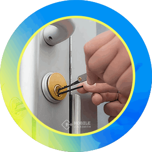 Close-Up Of Business Deadbolt Lock Being Opened With Specialized Locksmith Tools.