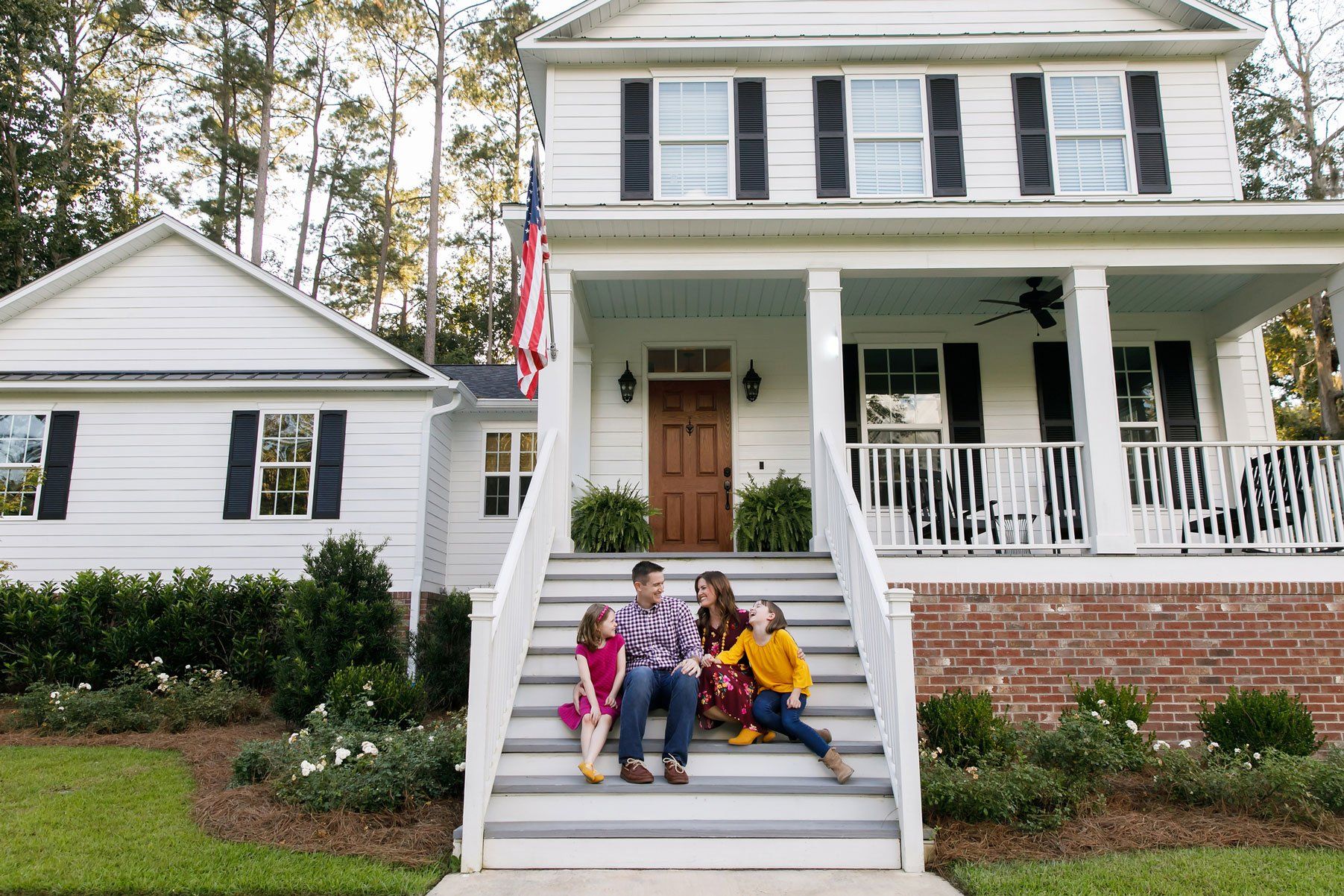 Elegant Residential House with Family Outside — Richmond, VA — Keil Plumbing & Heating, Inc.