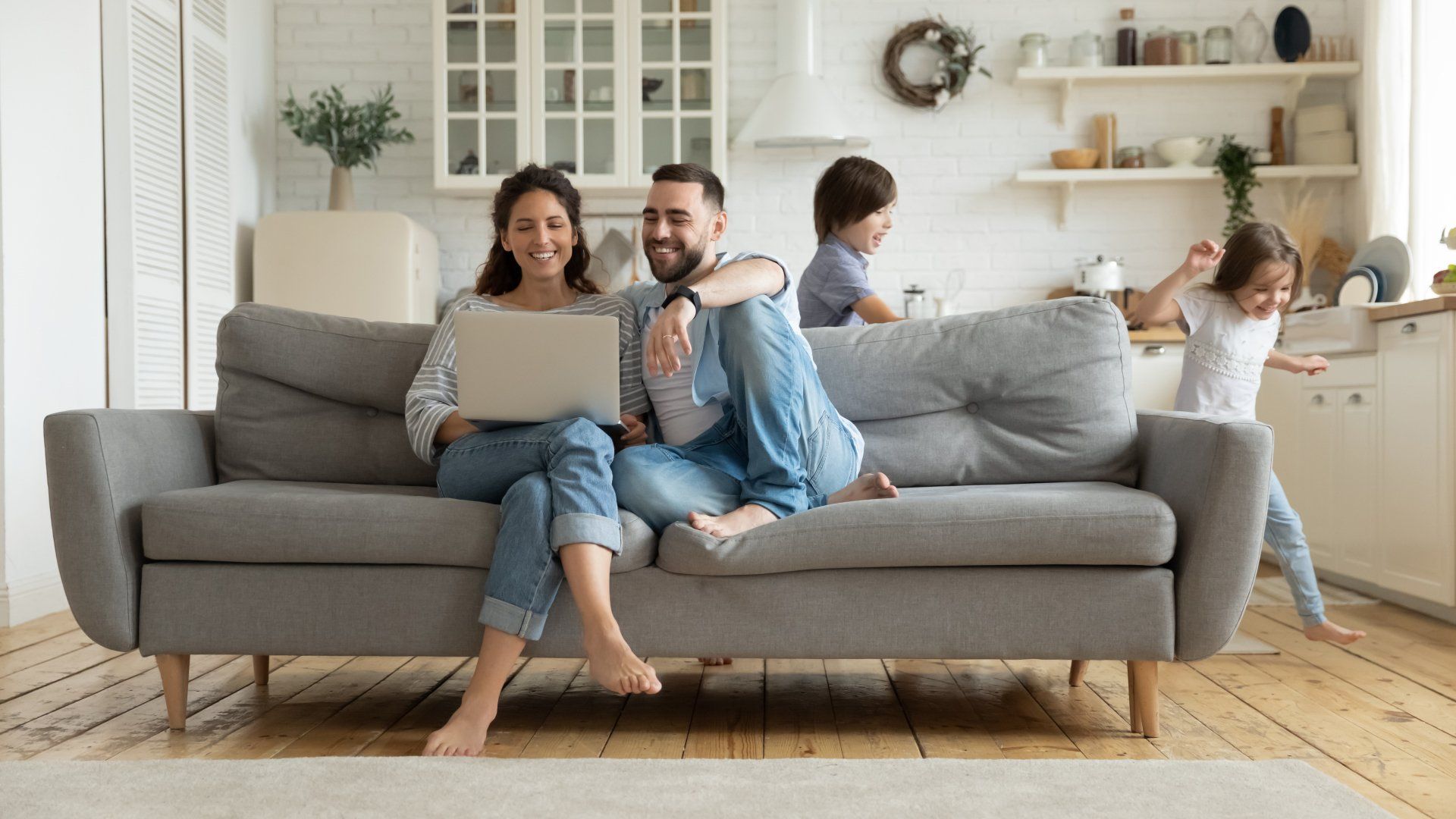 Parents Resting on Sofa — Richmond, VA — Keil Plumbing and Heating Inc