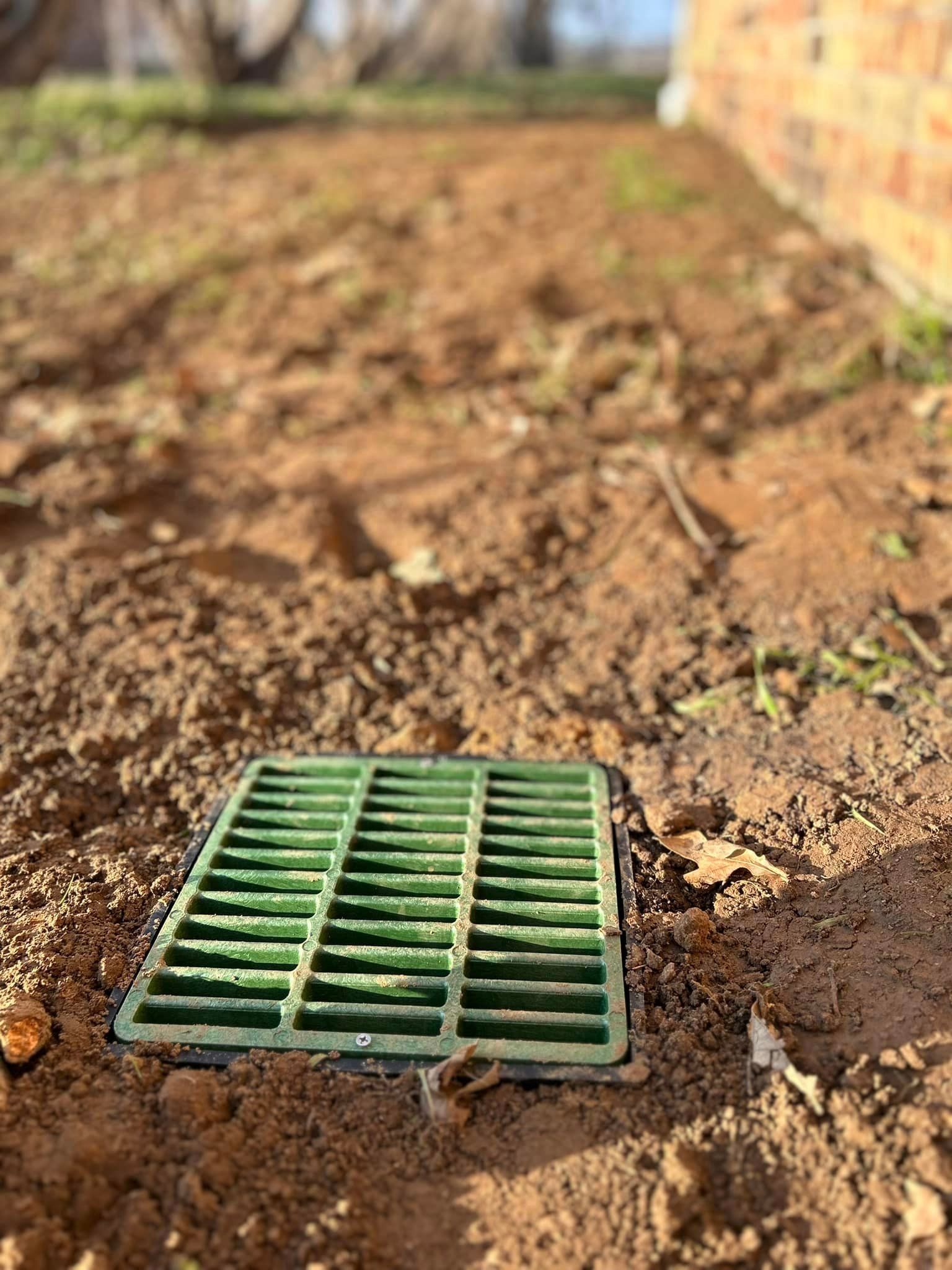 A Green Drain Cover - Collinsville, TX - L5 Irrigation