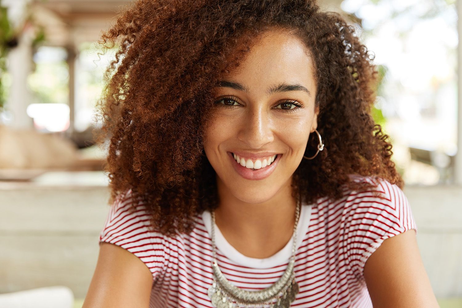 Smiling woman with white teeth