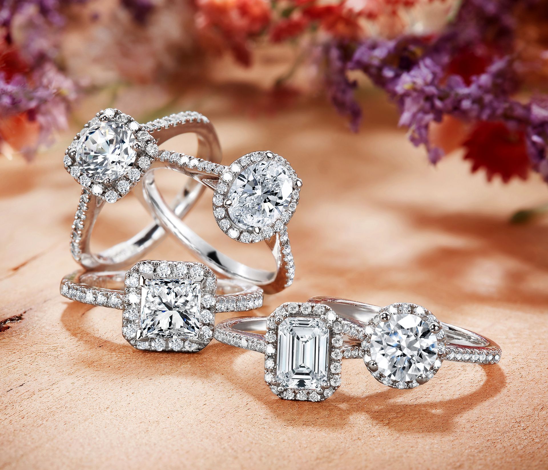 A close up of a ring with a pink stone