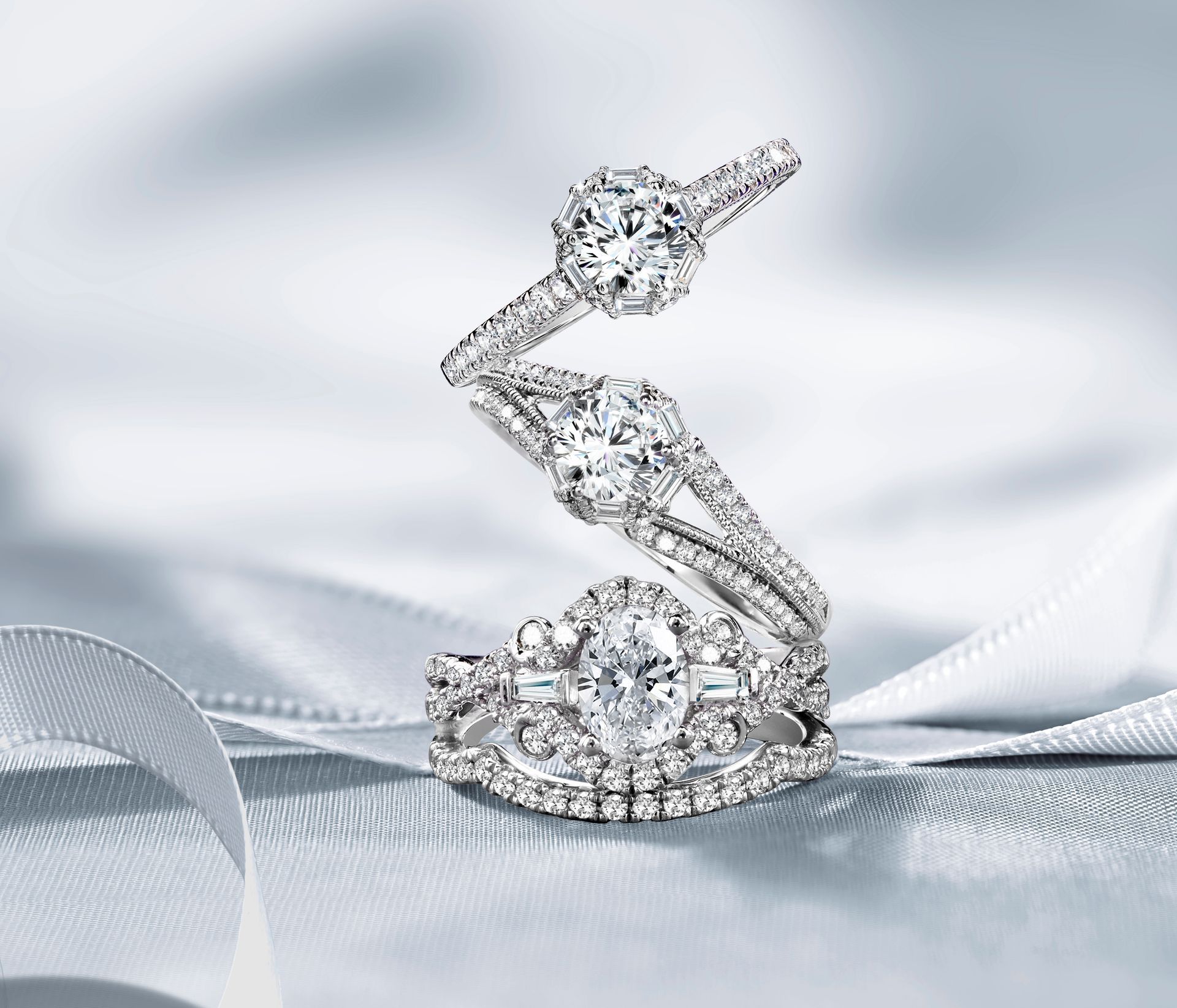 A black and silver dkny watch on a gold background